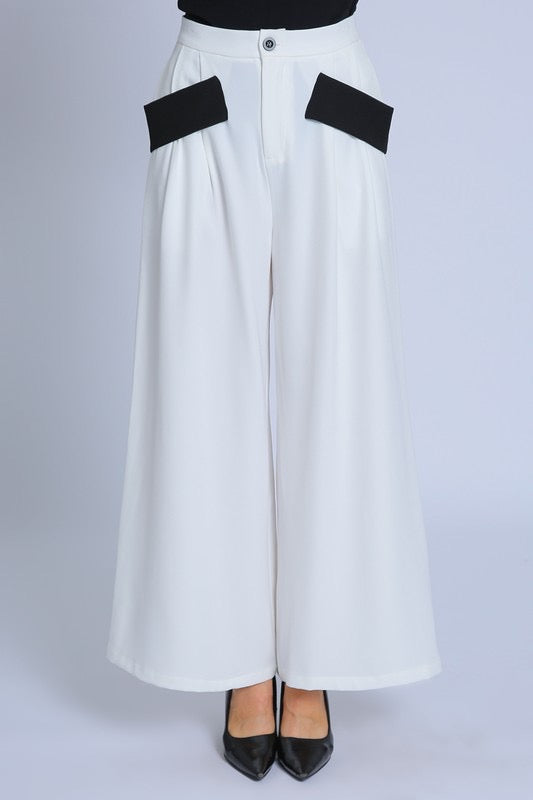 White pants black pockets