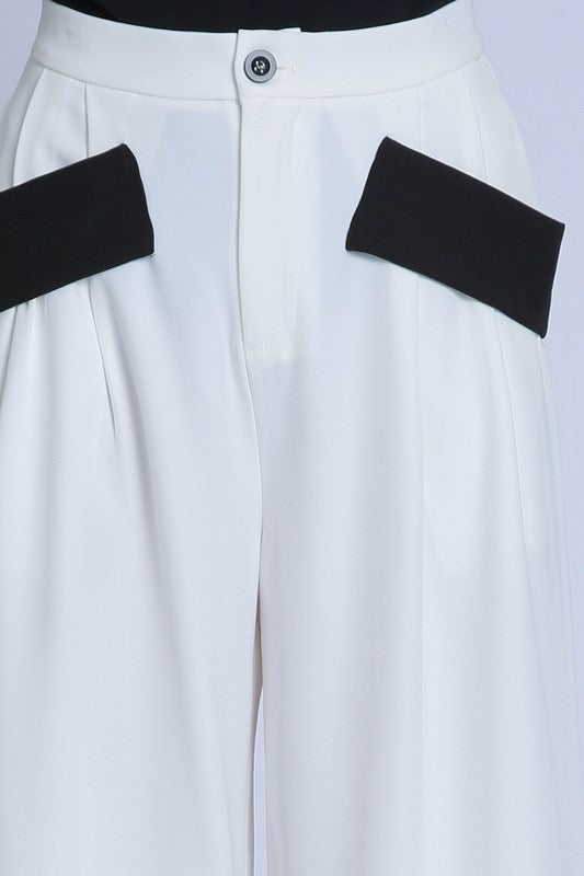 White pants black pockets