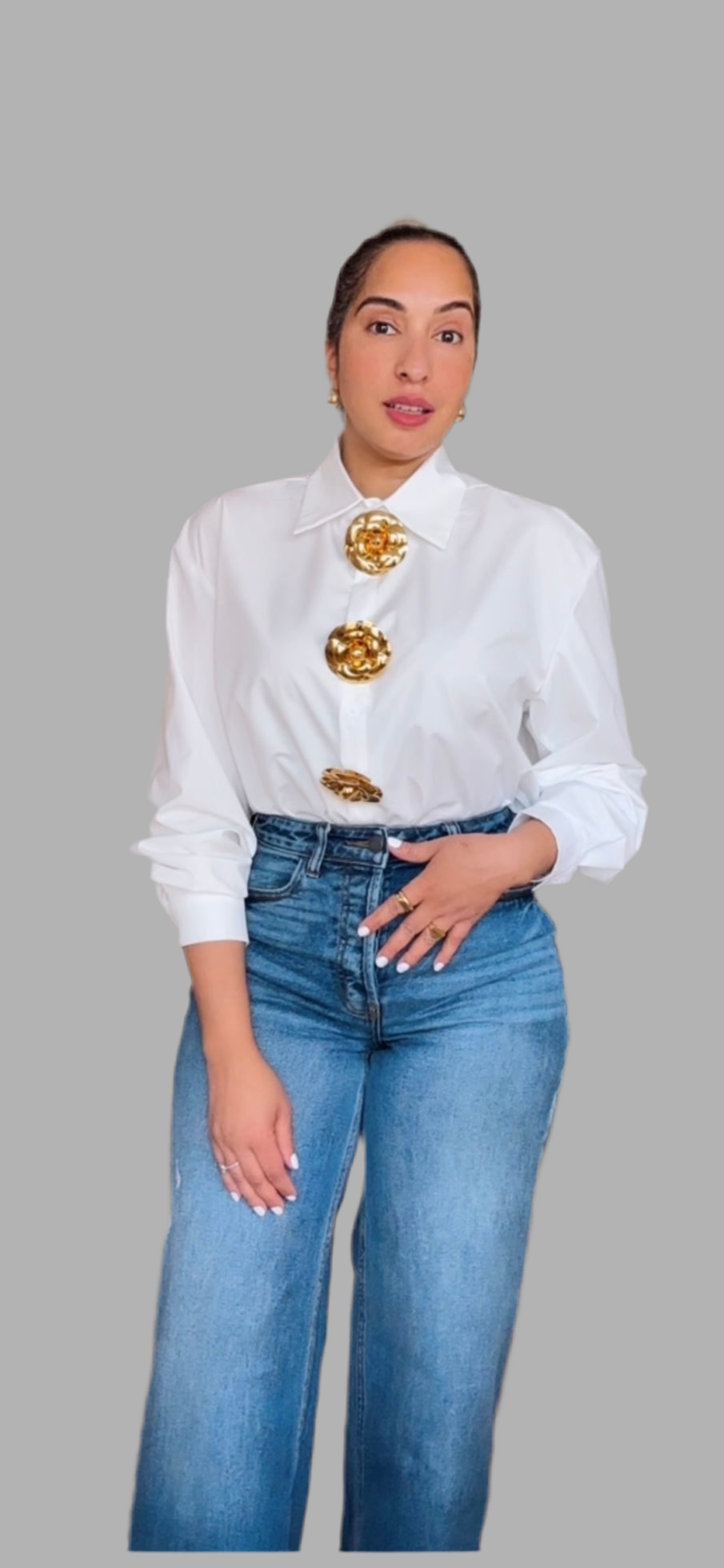 Gold buttons white top